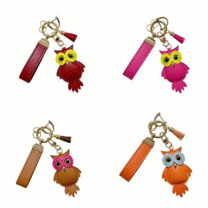 Cute faux leather owl keychain.
